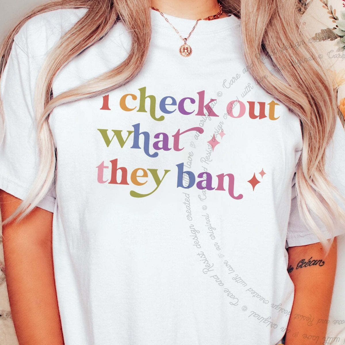I Check Out What They Ban Care & Resist rainbow tee