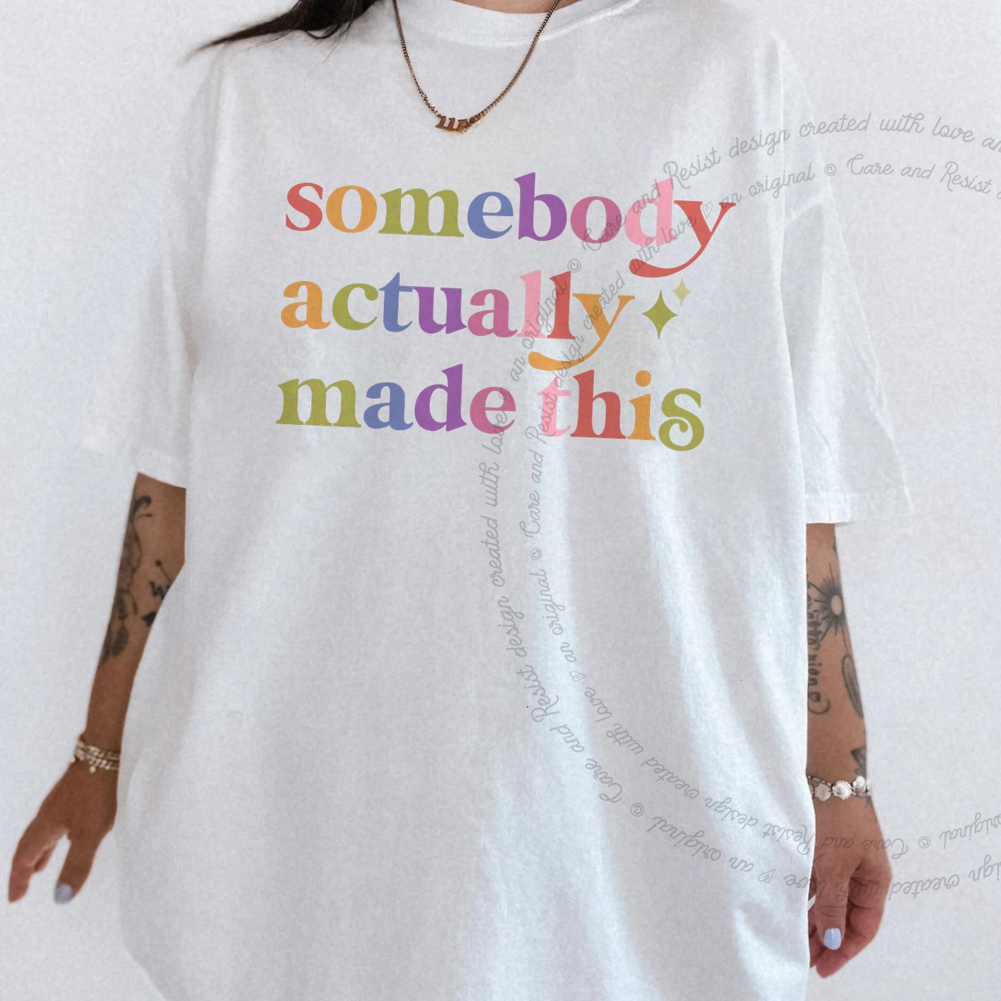 Somebody Actually Made This Care & Resist rainbow tee