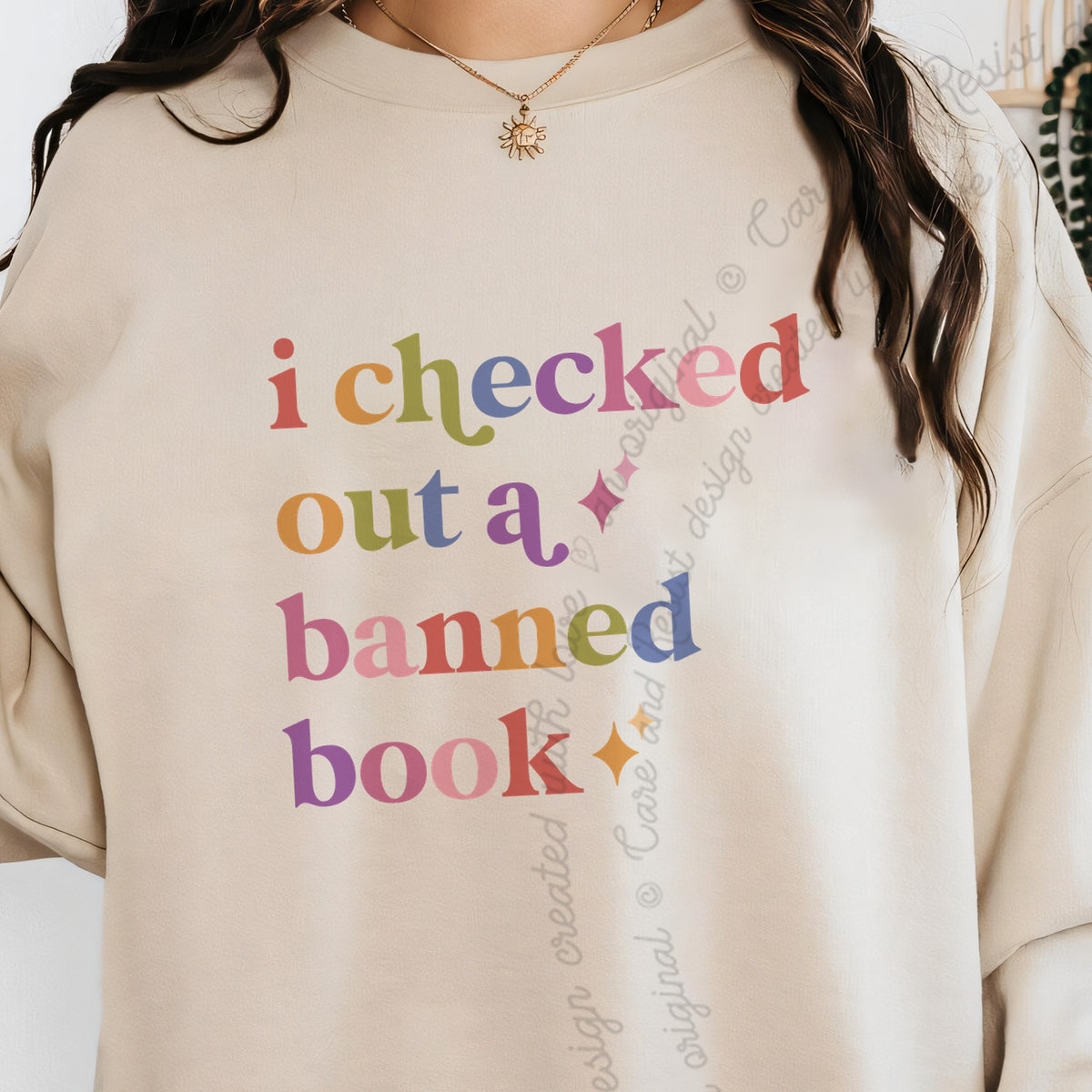 I Checked Out a Banned Book Care & Resist Gildan crewneck sweatshirt in Sand