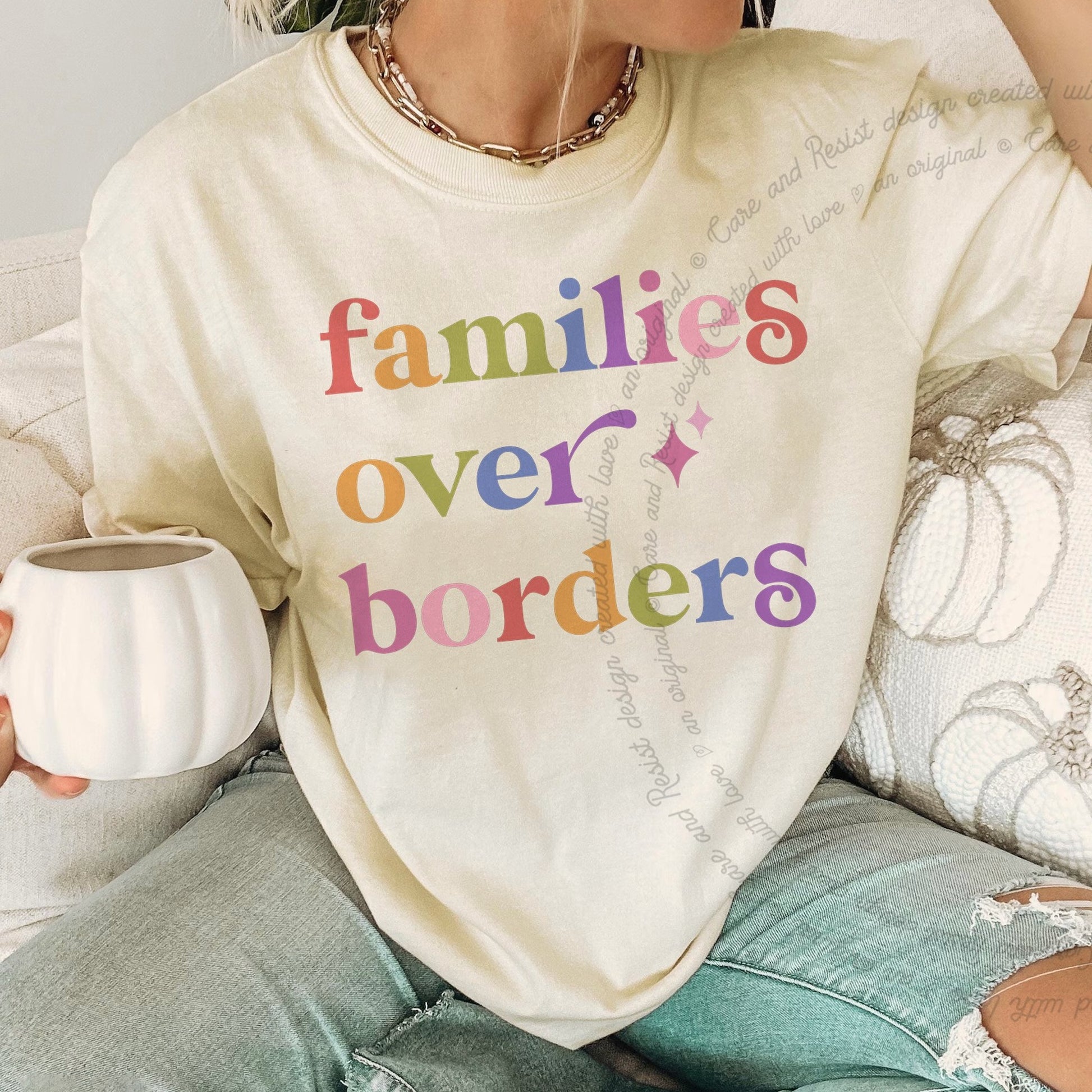 Families Over Borders Care & Resist rainbow Comfort Colors tee, Ivory
