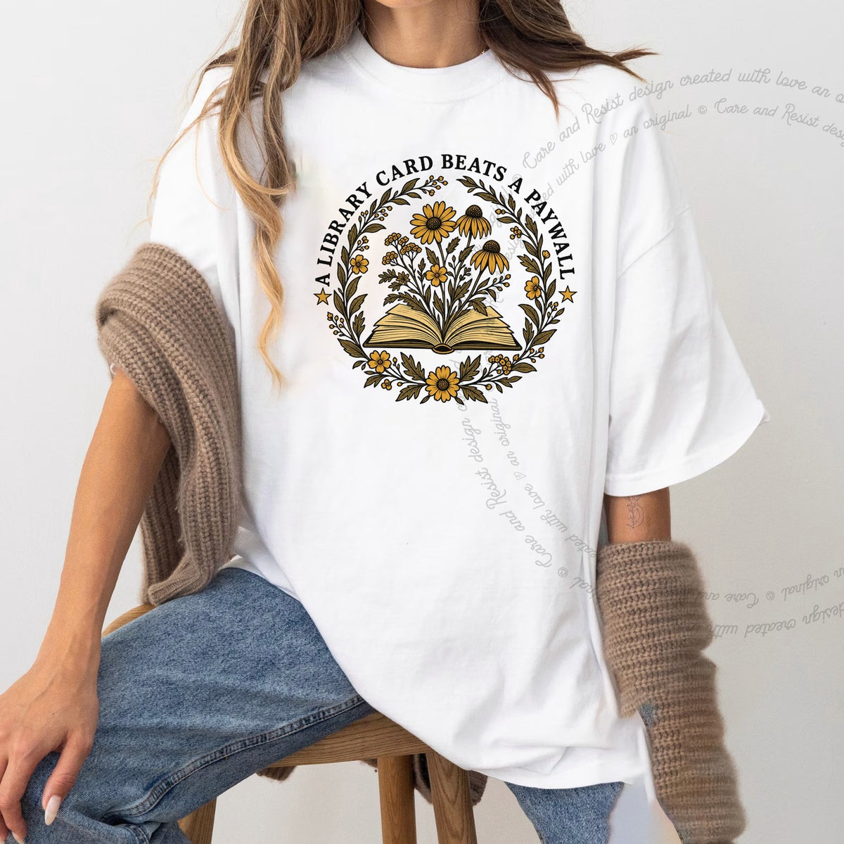 A Library Card Beats a Paywall Badge Care & Resist progressive t-shirt in White