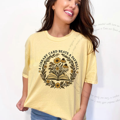 A Library Card Beats a Paywall Badge Care & Resist progressive t-shirt in Banana