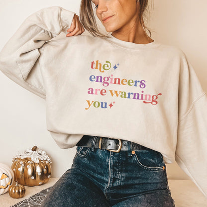 The Engineers are Warning You Care & Resist Gildan crewneck sweatshirt in Sand