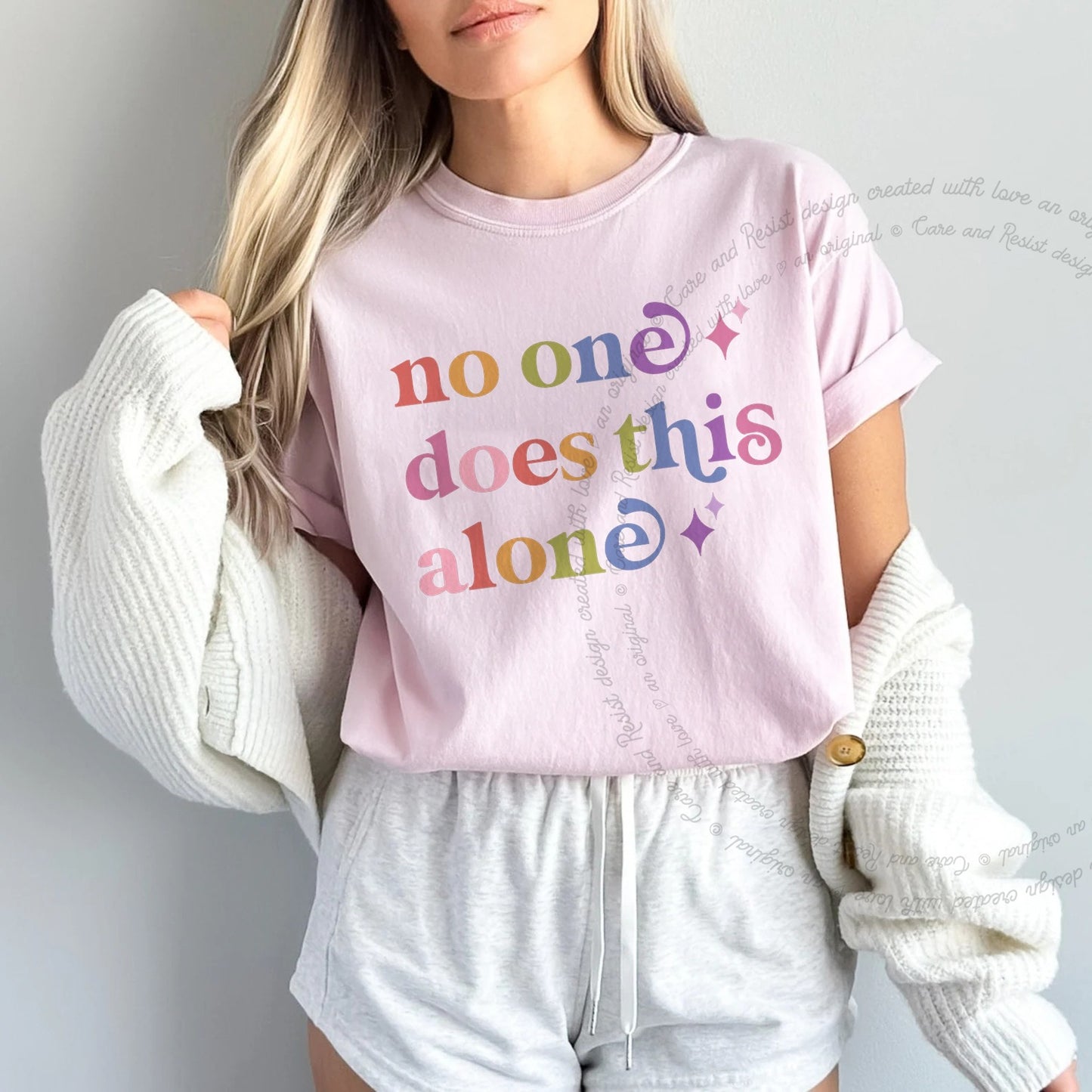 No One Does This Alone Care & Resist rainbow tee