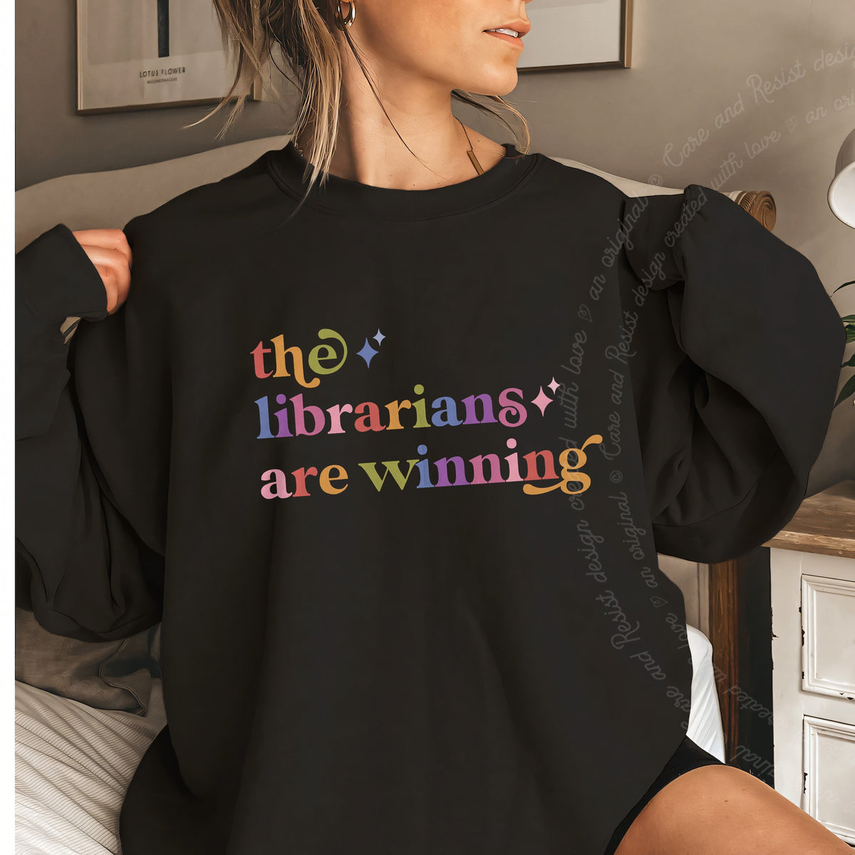 The Librarians are Winning Care & Resist Gildan crewneck sweatshirt in Black