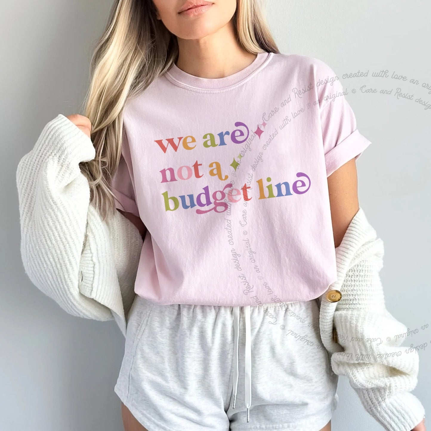 We are not a Budget Line Care & Resist rainbow Comfort Colors tee, Blossom