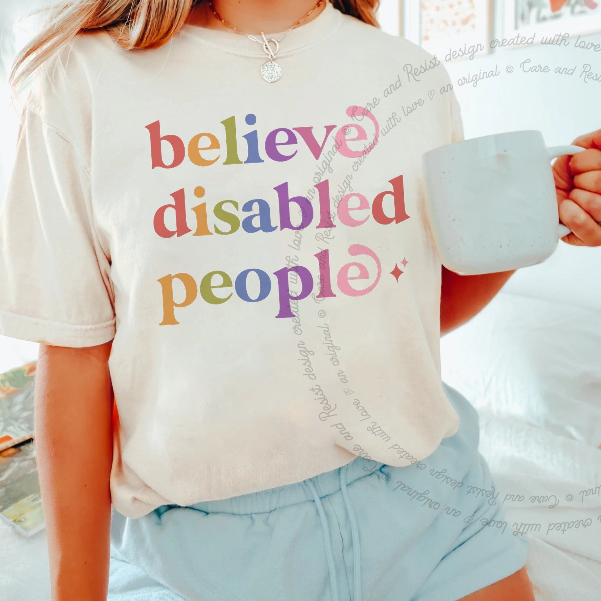 Believe Disabled People Care & Resist rainbow Comfort Colors tee, Ivory