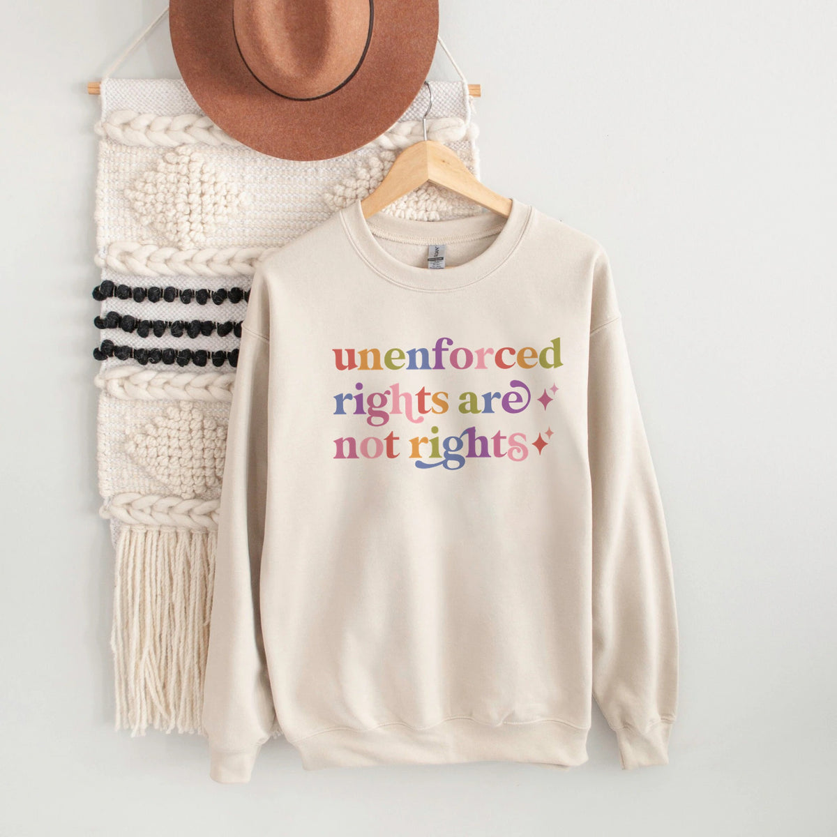 Unenforced Rights are not Rights Care & Resist Gildan crewneck sweatshirt in Sand