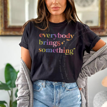 Everybody Brings Something Care & Resist rainbow tee