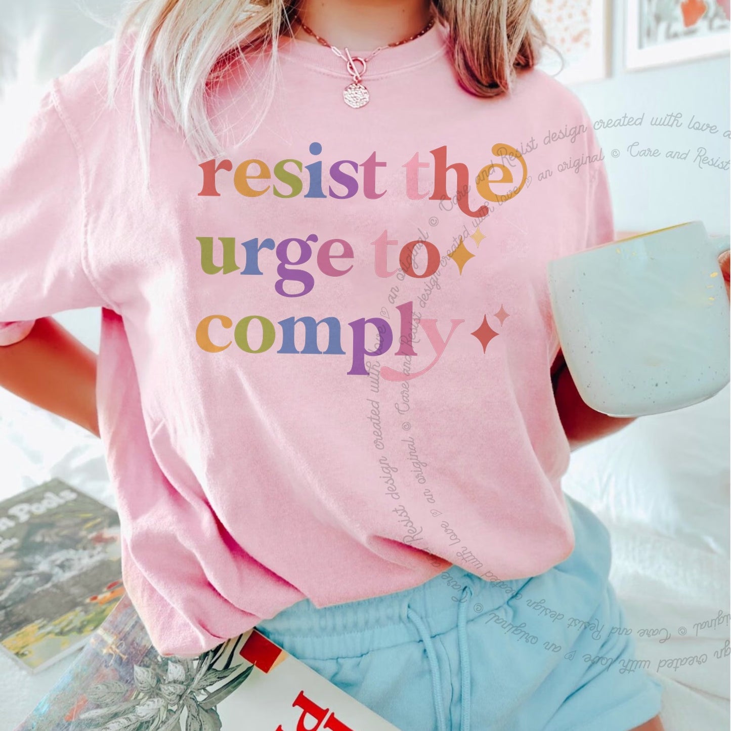 Resist the Urge to Comply Care & Resist rainbow Comfort Colors tee, Blossom