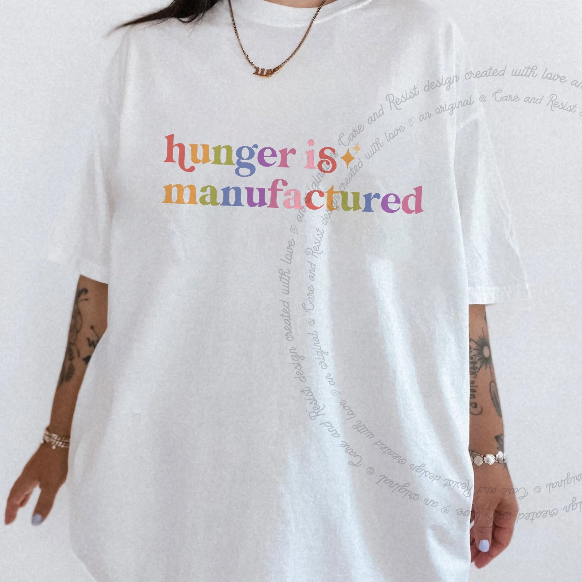 Hunger is Manufactured Care & Resist rainbow Comfort Colors tee, White