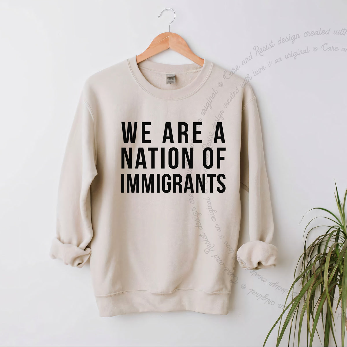 We Are a Nation of Immigrants Care & Resist Gildan crewneck sweatshirt in Sand