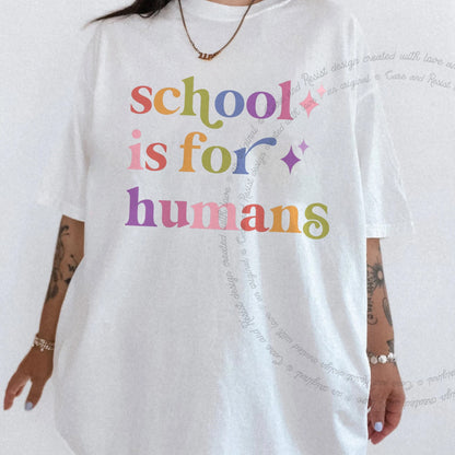 School is for Humans Care & Resist rainbow tee