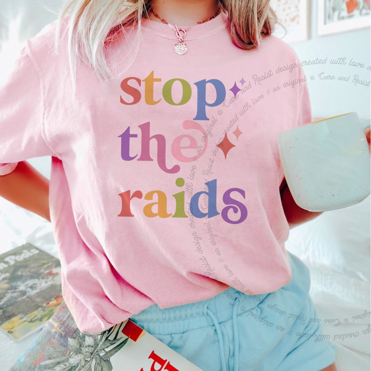 Stop the Raids Care & Resist rainbow Comfort Colors tee, Blossom