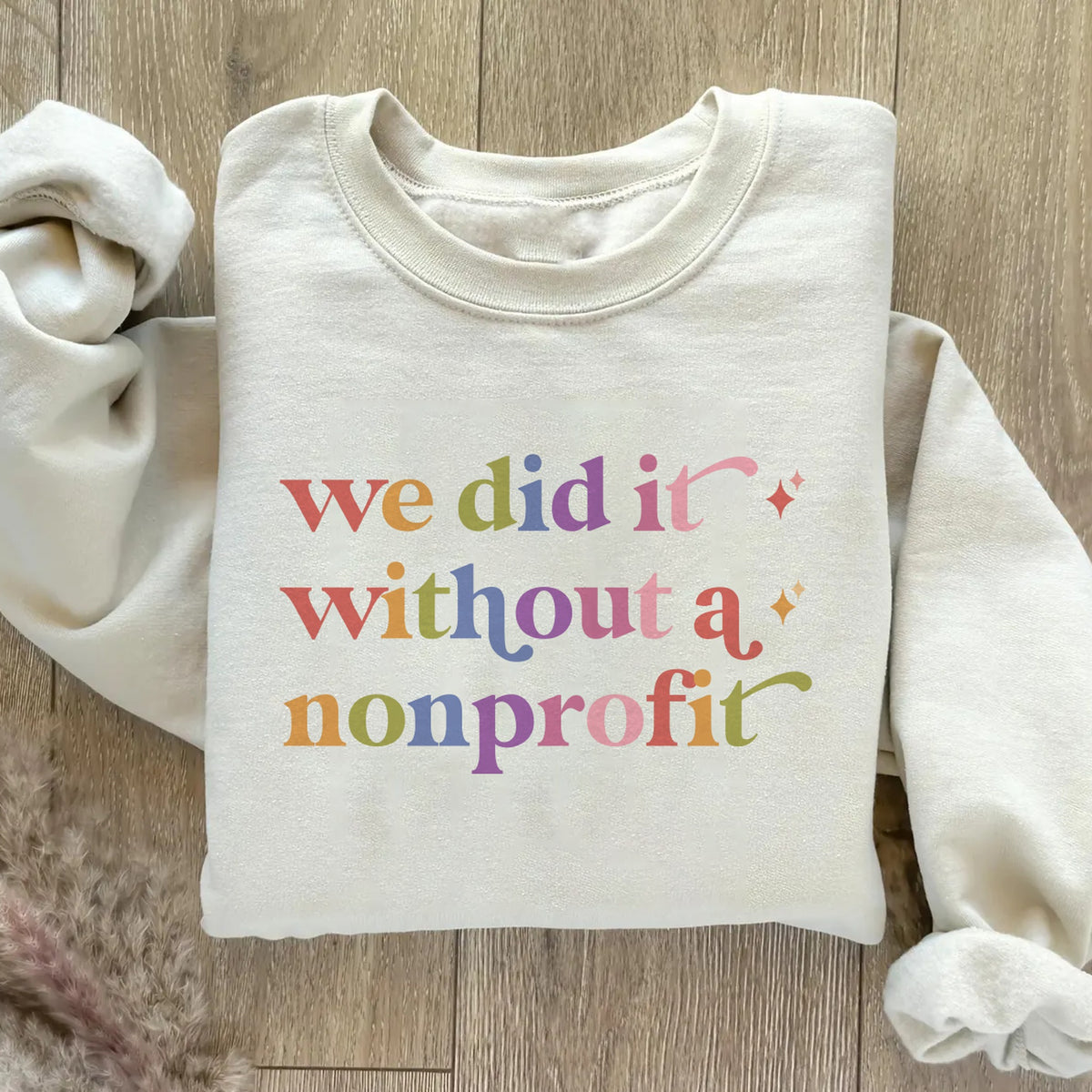 We Did It Without a Nonprofit Care & Resist Gildan crewneck sweatshirt in Sand