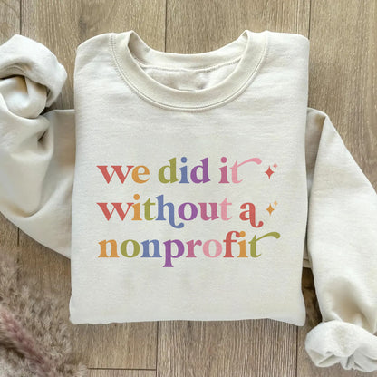 We Did It Without a Nonprofit Care & Resist Gildan crewneck sweatshirt in Sand