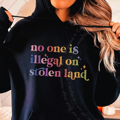 No One Is Illegal on Stolen Land Care & Resist Gildan hoodie in Black
