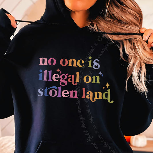 No One Is Illegal on Stolen Land Care & Resist Gildan hoodie in Black