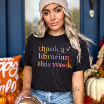 Thank a Librarian This Week Care & Resist rainbow tee