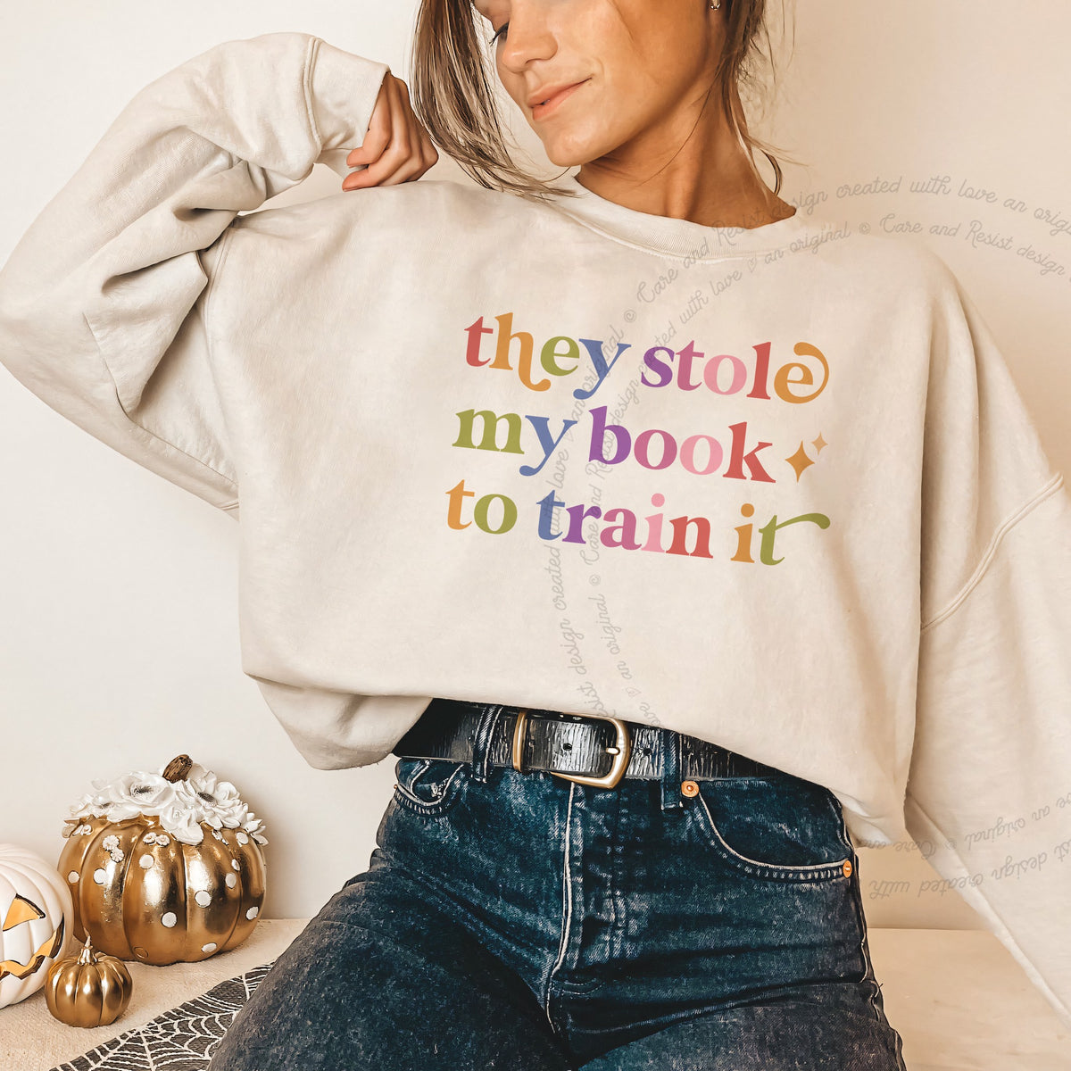 They Stole My Book to Train It Care & Resist Gildan crewneck sweatshirt in Sand