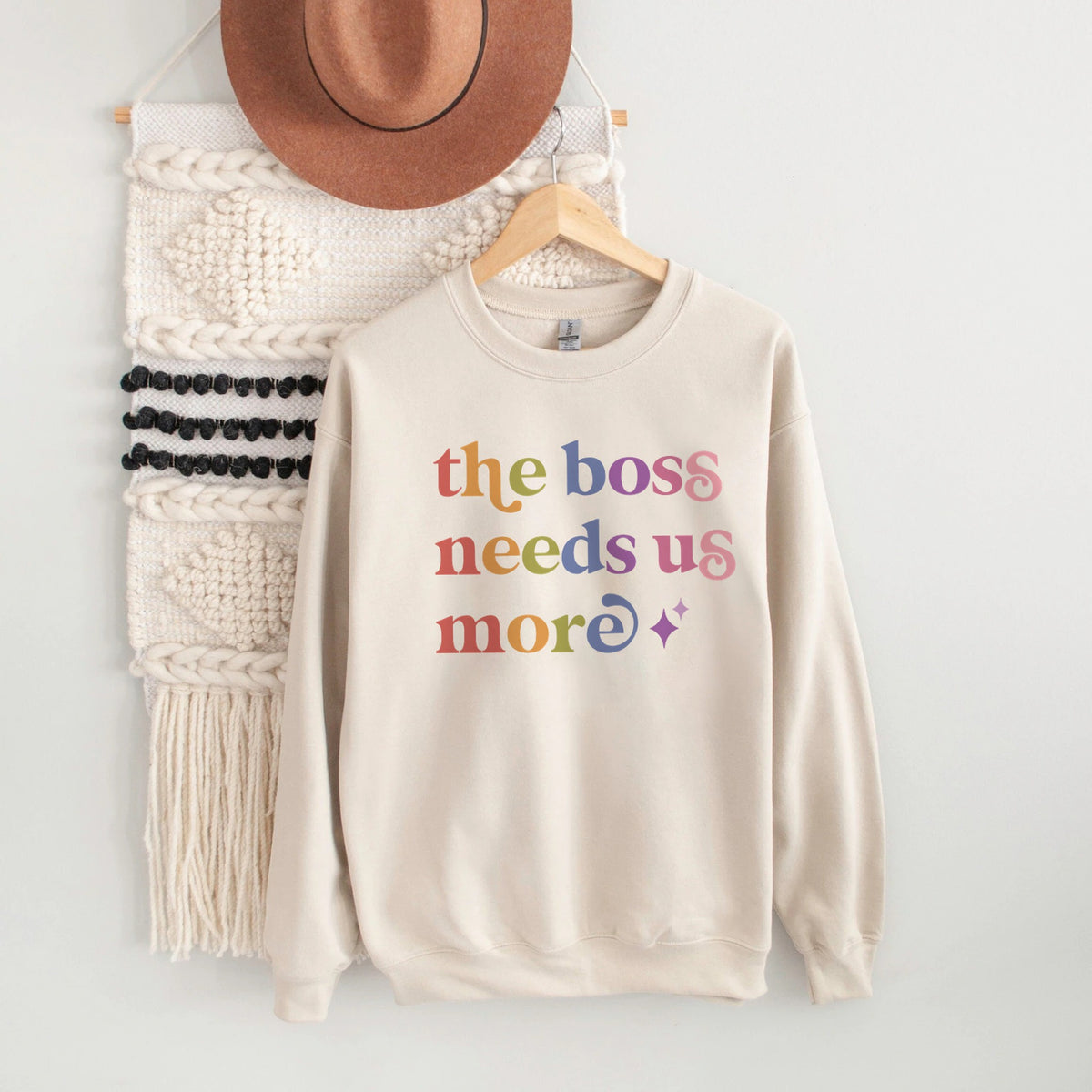 The Boss Needs Us More Care & Resist Gildan crewneck sweatshirt in Sand