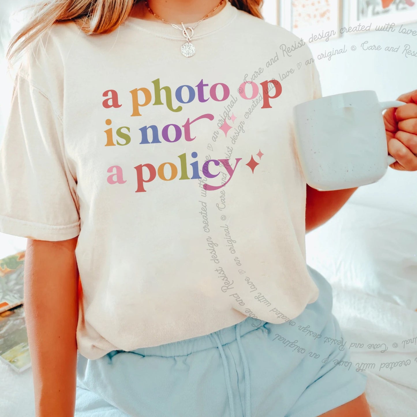 A Photo Op is not a Policy Care & Resist rainbow tee